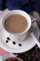 Hot coffee in white ceramic mug