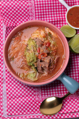 Suki, pork and vegetables in ceramic cup