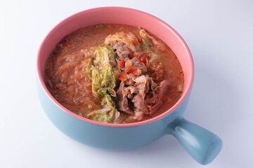 Suki, pork and vegetables in ceramic cup