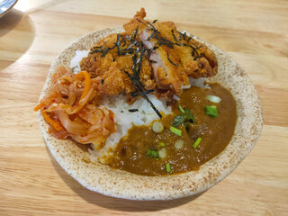 Japanese curry curry rice on wooden background
