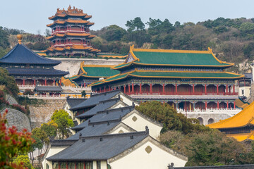 Chinese traditional colorful Baotuo lecture temples in the Putuoshan mountains, Zhoushan Islands,  a renowned site in Chinese bodhimanda of the bodhisattva Avalokitesvara (Guanyin)