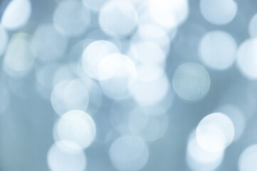 Defocused abstract blue-white christmas background. Christmas bokeh