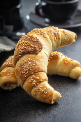 Salted croissant bun roll. Homemade pastry.