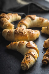 Salted croissant bun roll. Homemade pastry.
