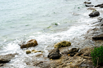 sea waves and rock coast, seascape in Thailand