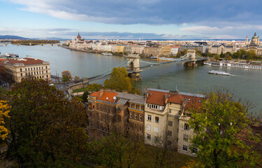 Fototapeta na wymiar Panorama with Chain Bridge and Parliament of Budapest outdoors.