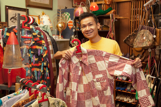 Malaysian man shopping in vintage store