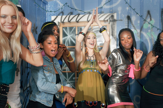 Friends dancing at party