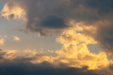 glowing clouds on evening sky. beautiful nature background