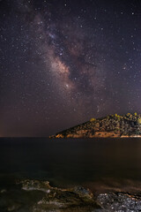 Naklejka na ściany i meble Milky Way galaxy over the Aegean sea