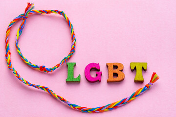 LGBT colorful lettering on lilac background. rights concept