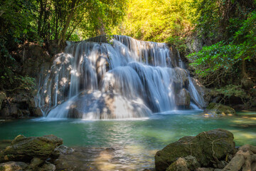 Fototapeta na wymiar Huay Mae Khamin Waterfall consists of 7 levels. It is a beautiful waterfall in deep forest. It is an important and popular tourist destination in Kanchanaburi, Thailand.