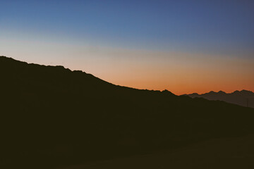 mountains in the setting sun