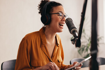 Woman enjoying podcasting from home