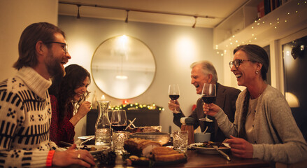 Family at dining table for christmas dinner