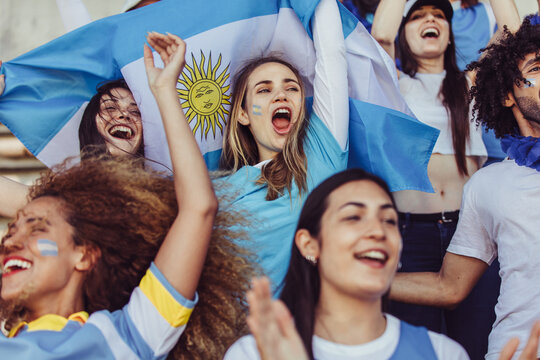 Females from Argentina cheering in fan zone