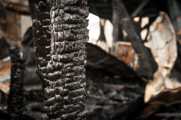 Fototapeta na wymiar Wooden frame house after a fire