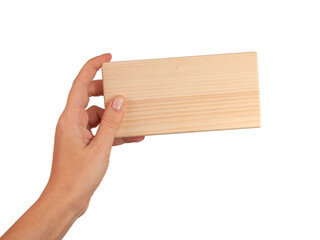 Wooden brick block in hand isolated on the white