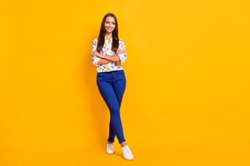 Photo portrait full body view of pretty confident woman with folded arms isolated on vivid yellow colored background