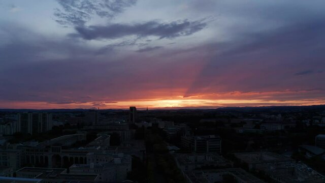 Aerial video of downtown Montpellier in France during the sunset, place de l'europe.