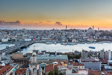 Aerial view of golden horn in the strait of Bosporus under sunset from the gala tower in Istanbul, Turkey, view from the Galata tower.