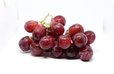 Red Grapes isolated on over white background.