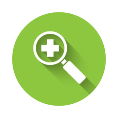 Fototapeta premium White Magnifying glass for search medical icon isolated with long shadow. Hospital search. Green circle button. Vector Illustration.