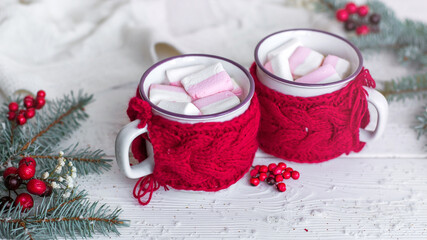 Two cups of  of coffee with marshmellows. Christmas decoration