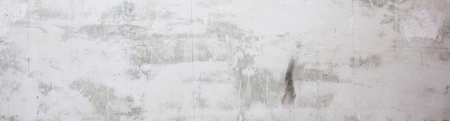 Gray concrete wall peeled wallpaper. Concrete background. Banner.