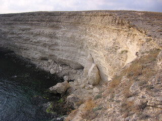 deep water cave backwater for swimming and diving in the mountains steep Bank