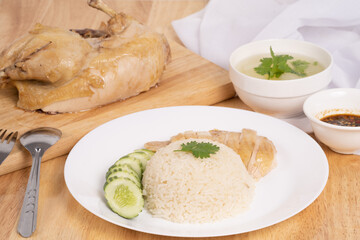 Chicken rice on the wooden table.
