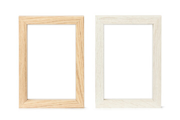 Wooden and white vertical  picture frames isolated with clipping path on white background