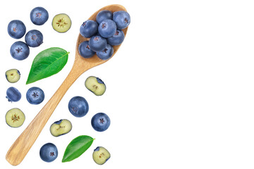 fresh ripe blueberry in wooden spoon isolated on white background. Top view with copy space for your text. Flat lay