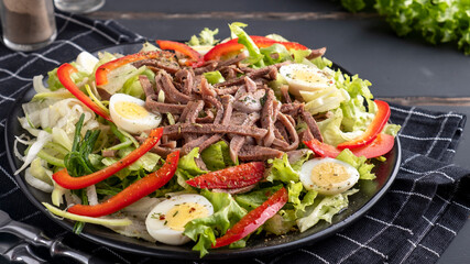 Beef tongue salad with fresh vegetables