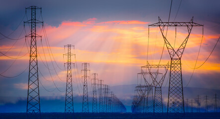 High voltage power lines with amazing sunset
