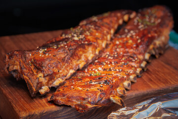 smoked pork rack barbeque on woodenn board