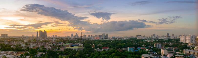 Panorama picture of city under dramatic sky