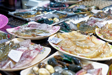Fresh seafood plate in the fishing market in Thailand