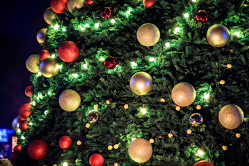 Obraz na płótnie Canvas Christmas toys on fir tree