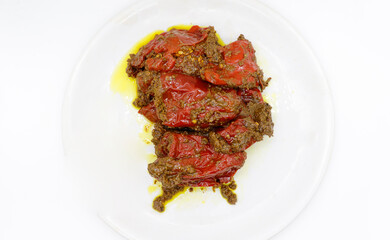 Homemade spicy fresh Red Chilli pickle or Lal Mirch achar  on white background isolated