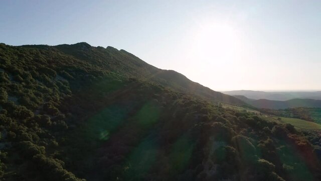 aerial view of a mountain and a big forest around, pic st loup summit in france, near to Montpellier 