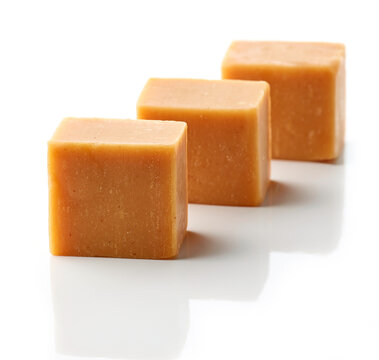 caramel candies on a white background
