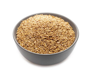 Golden linseed, linen seeds in porcelain bowl isolated on white background