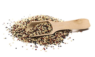 Tri-color quinoa seeds blend pile with wooden spoon isolated on white background