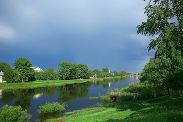 summer park landscape, green trees and walkway in the summer city park