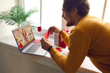 Happy young couple in love miss each other in lockdown and have romantic virtual dates