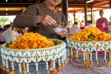 Thong Yod and Thong-ek are placed on banana leaves in Khan Tok.
