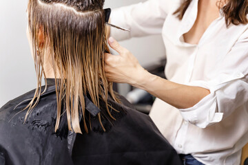 hair cutting process in a beauty salon