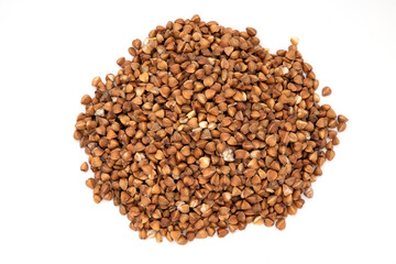 Pile of buckwheat isolated on white background.