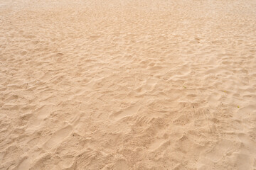 Fototapeta na wymiar Sand background at the beach.